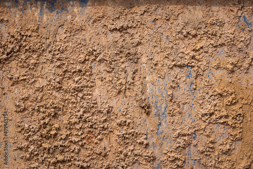 Obraz na plátně Dried roughly clay or mud on metal chemical waste containment storage tank's surface