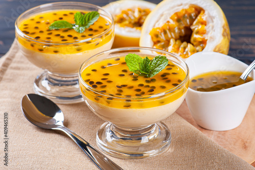 .Passion fruit mousse. Refreshing dessert with fresh passion fruit topping photo