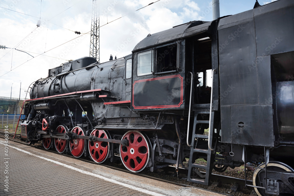 The locomotive of the last century standing under steam The locomotive of the last century standing under steam