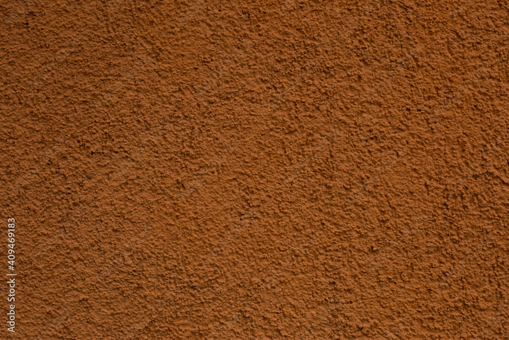 Old retro scrutched yellow brown plaster stucco wall background Old retro scrutched yellow brown plaster stucco wall background