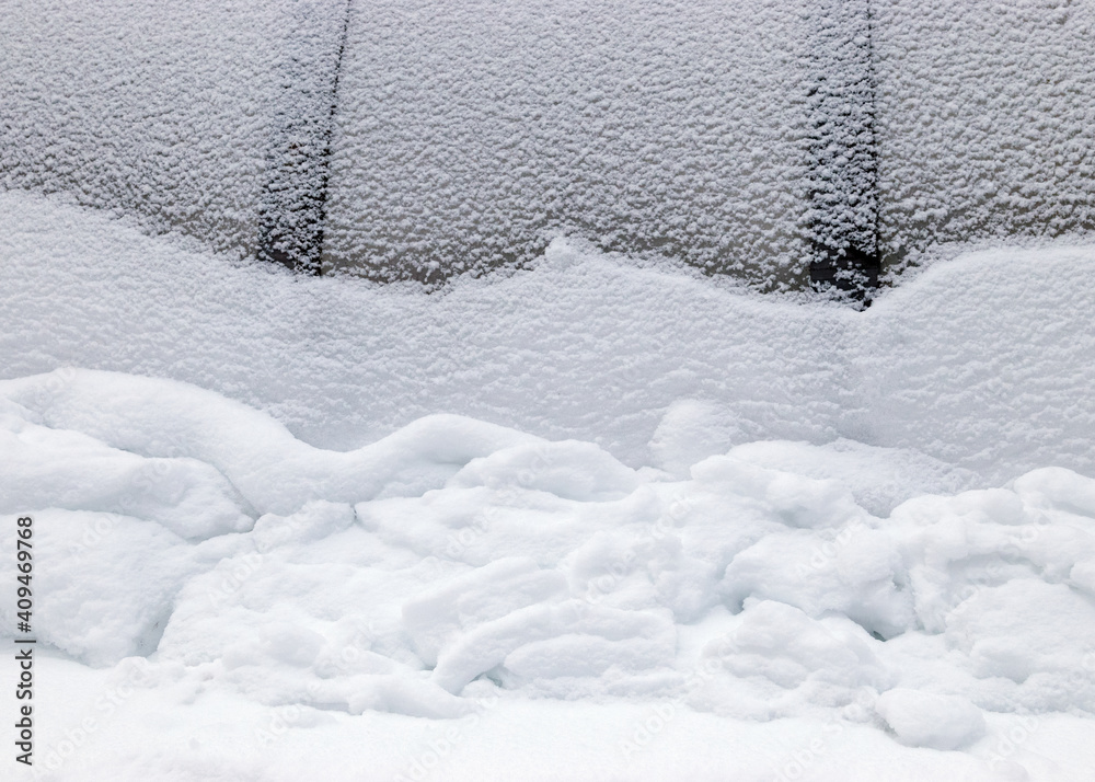 Abstract snow texture fragments on film greenhouse, white snow, winter day Abstract snow texture fragments on film greenhouse, white snow, winter day