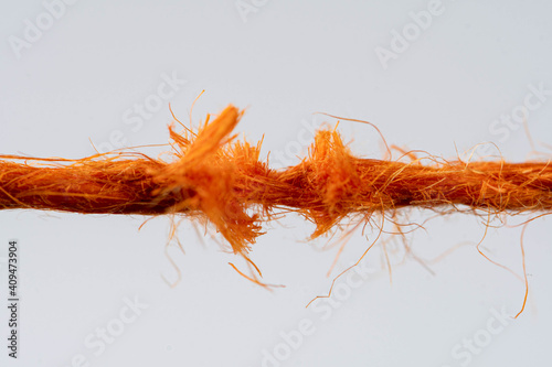 Fotografía Tear test of a red thread closeup