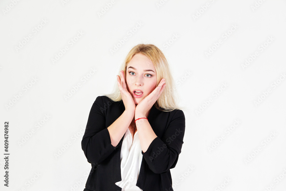 Studio portrait of blonde girl isolated on white background. Studio portrait of blonde girl isolated on white background.