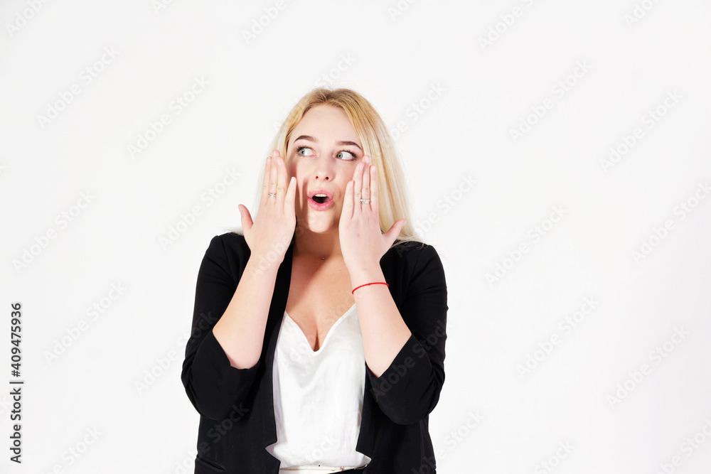 Studio portrait of blonde girl isolated on white background. Studio portrait of blonde girl isolated on white background.