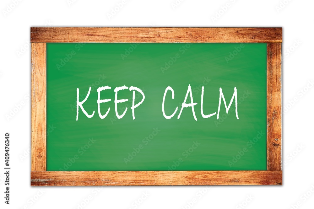 KEEP CALM text written on green school board. KEEP CALM text written on green school board.