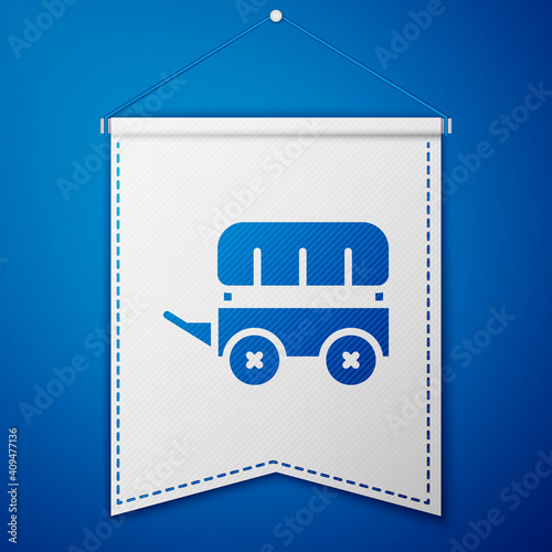 Blue Wild west covered wagon icon isolated on blue background. White pennant template. Vector.