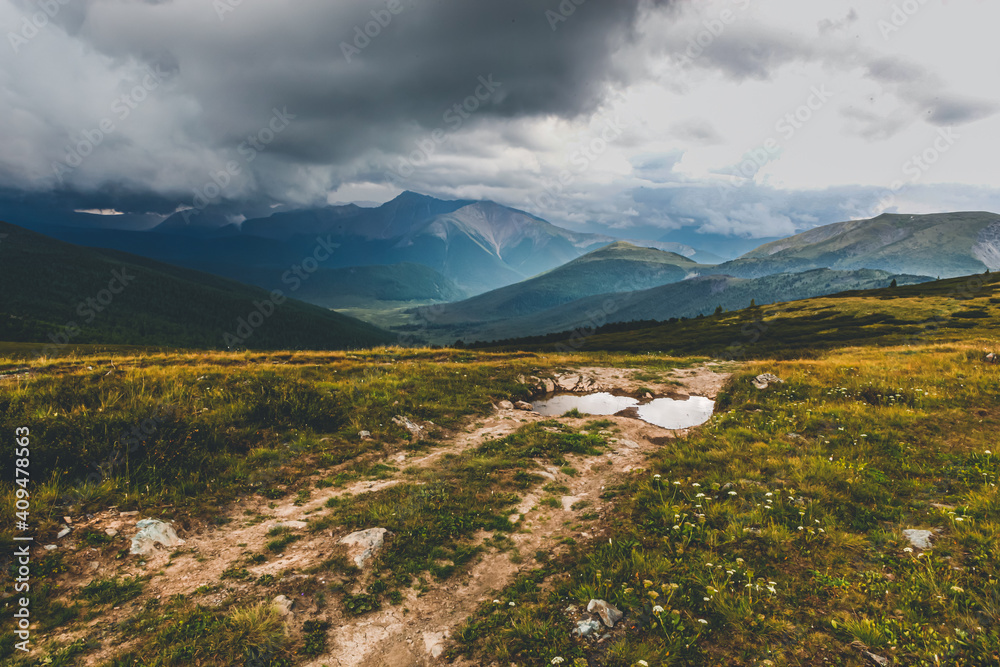 landscape in the mountains a moment before the storm