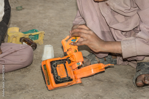 Wallpaper Mural closeup of a poor staring hungry orphan boy in a refugee camp with sad expression on his face and his face and clothes are dirty and his eyes are full of pain Torontodigital.ca