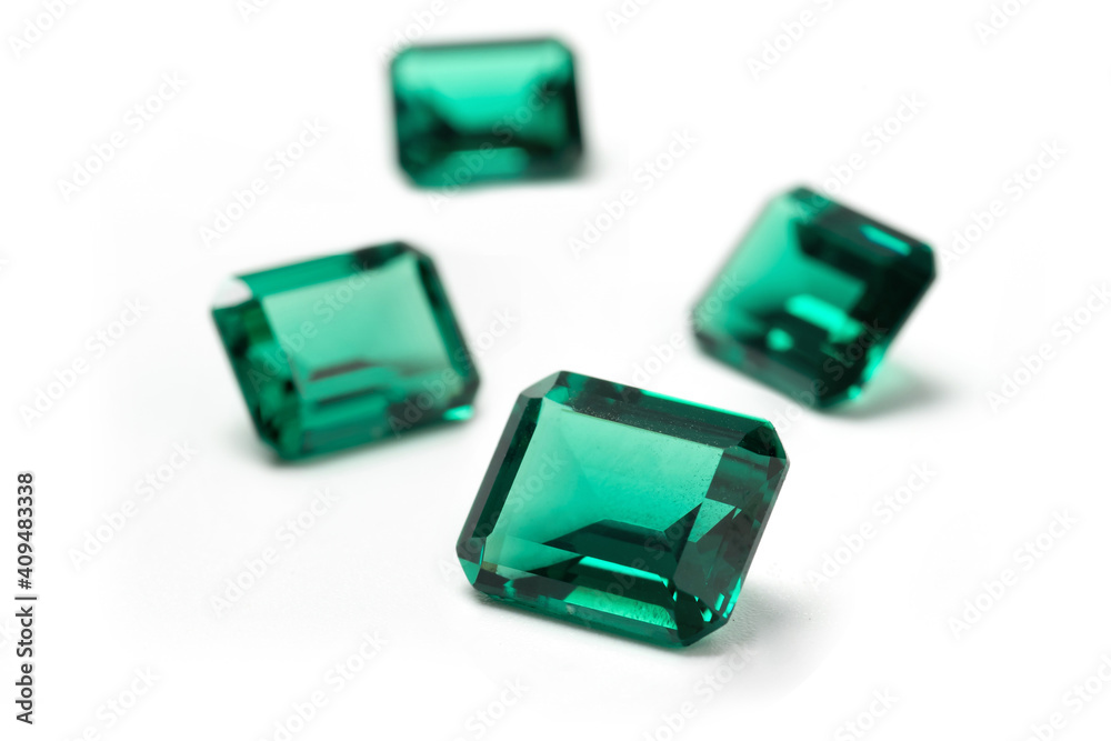 raw emeralds, gemstone jewelry isolated on white background raw emeralds, gemstone jewelry isolated on white background