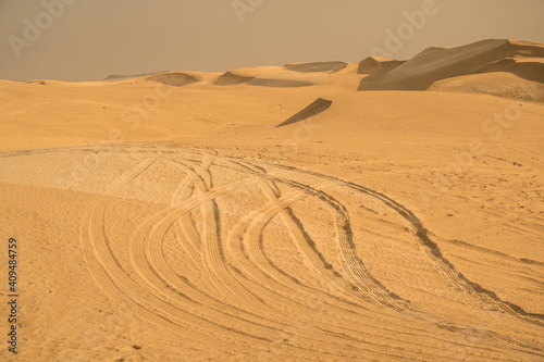 Tire tracks on a sand in desert
