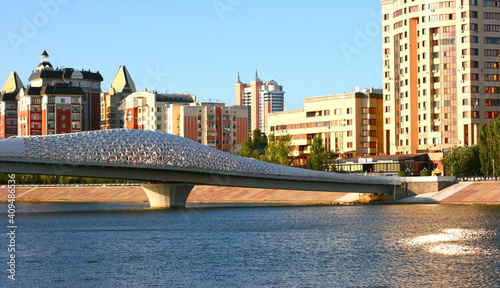 Nur-Sultan, Kazakhstan - August 19 2019: interior view of the Modern Pedestrian Atyrau bridge over the Ishim river. photo