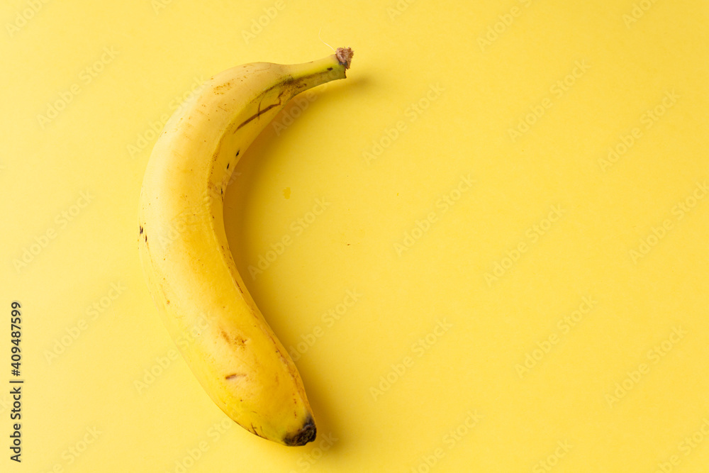 Yellow bananas on a yellow background Yellow bananas on a yellow background