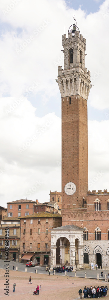 Tourists visiting the sights of the Piazza del Campo.Siena