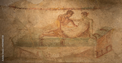 Erotic frescoes on the walls lupanariya Pompei photo