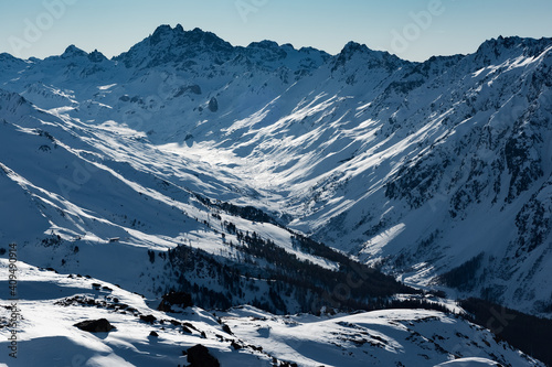 Sunny winter day in alpine ski resort with blue sky and bright white snow, Ischgl and Samnaun, Silvretta Arena, Austria - Switzerland © ElenaIvanova