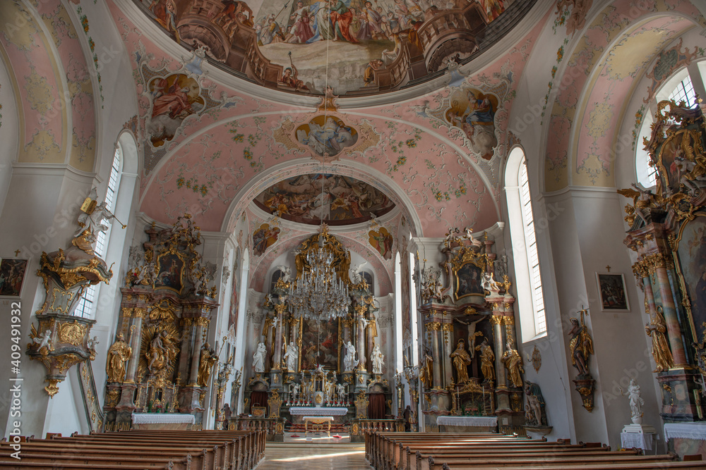 Interior architecture with furniture, decorations, frescoes and sculptures of the church of Paul Catholic Parish and St Peter in Oberammergau,