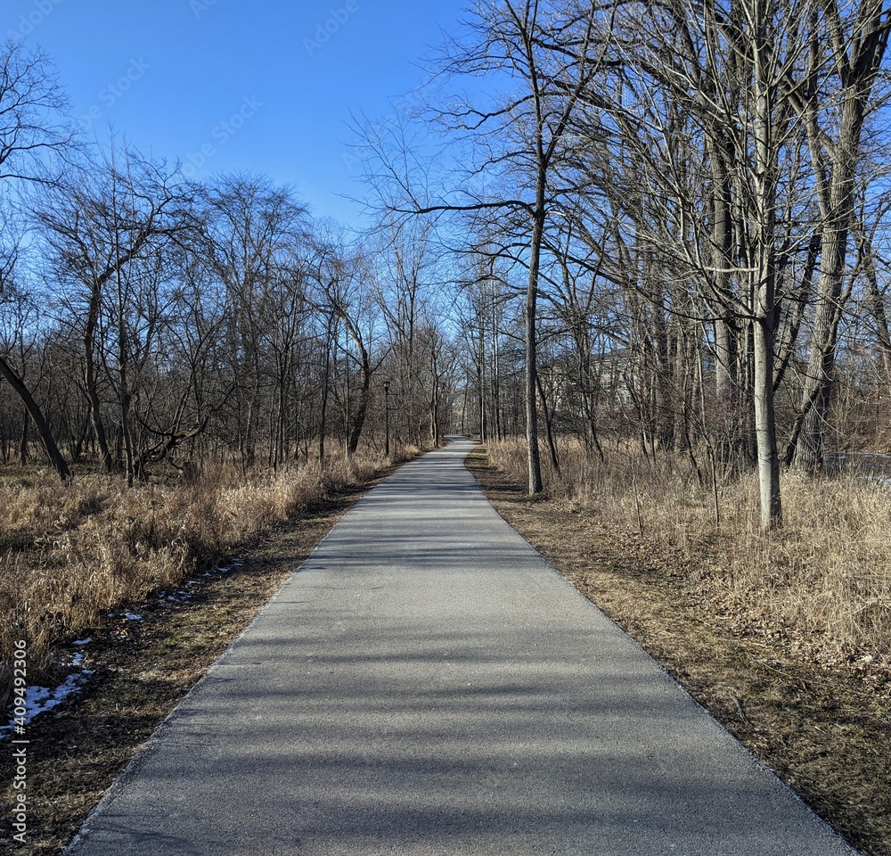 Fototapeta premium Concrete path on a clear winter day