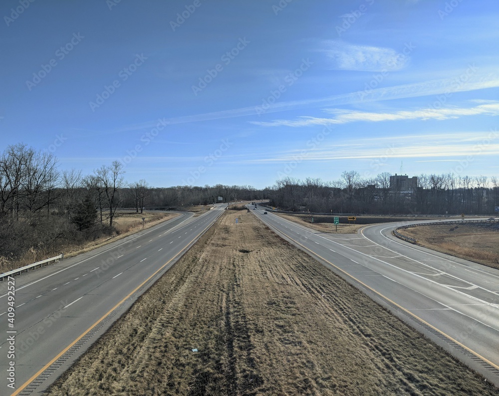 View of an empty highway on a bright day