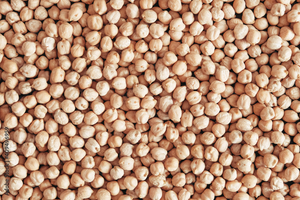 Dry chickpeas as a background texture. Top view. Copy, empty space for text Dry chickpeas as a background texture. Top view. Copy, empty space for text