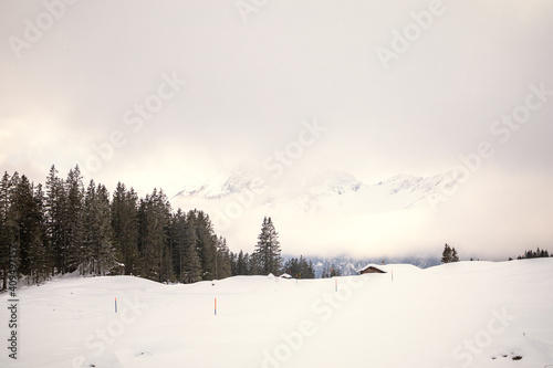 Cloudy and snowy mountain landscape