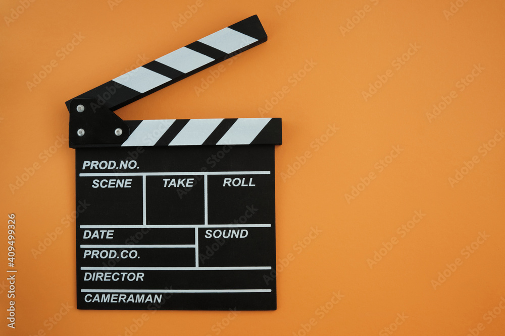 Clapboard for the cinema production  on the orange background