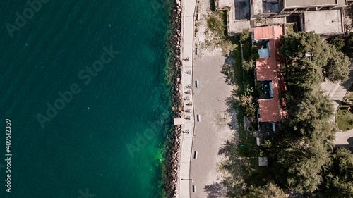 Aerial view of group of people riding bicycles in Kotor bay (Boka Kotorska), Montenegro, Europe