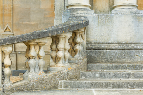 Stone steps and columns outside a manor house, UK photo