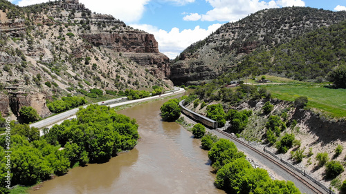 Colorado Zephyr in Glenwood Canyon along the Colorado River and Interstate 70 photo