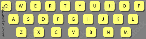 Yellow keyboard on a gray background. Yellow. Gray