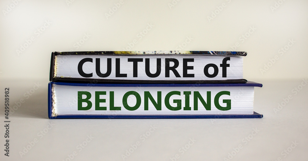 Culture of belonging symbol. Books with words 'culture of belonging' on beautiful white background. Business, culture of belonging concept. Copy space.
