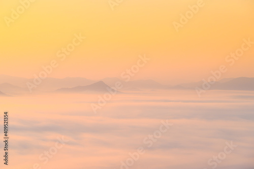 Misty landscape view from Phu Thok hill viewpoint  the famous viewpoint of Chiang Khan city in Loei province  Thailand