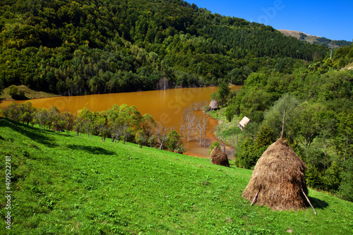 Valea Sessi in the Occidental Carpathians. Nature pollution of a copper mine exploitation photo