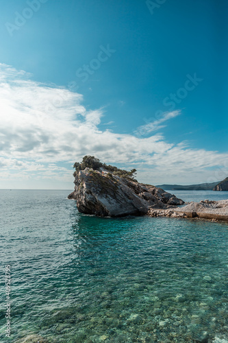 The beach and the cliff on the island of St. Nicholas in Budva  Montenegro.Paradise beach on an island in the sea