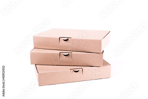 Closeup of Flat cardboard boxes isolated on white