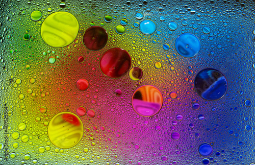 Abstract colorful bubbles. Freeze motion of color dust particles splash. Background image.