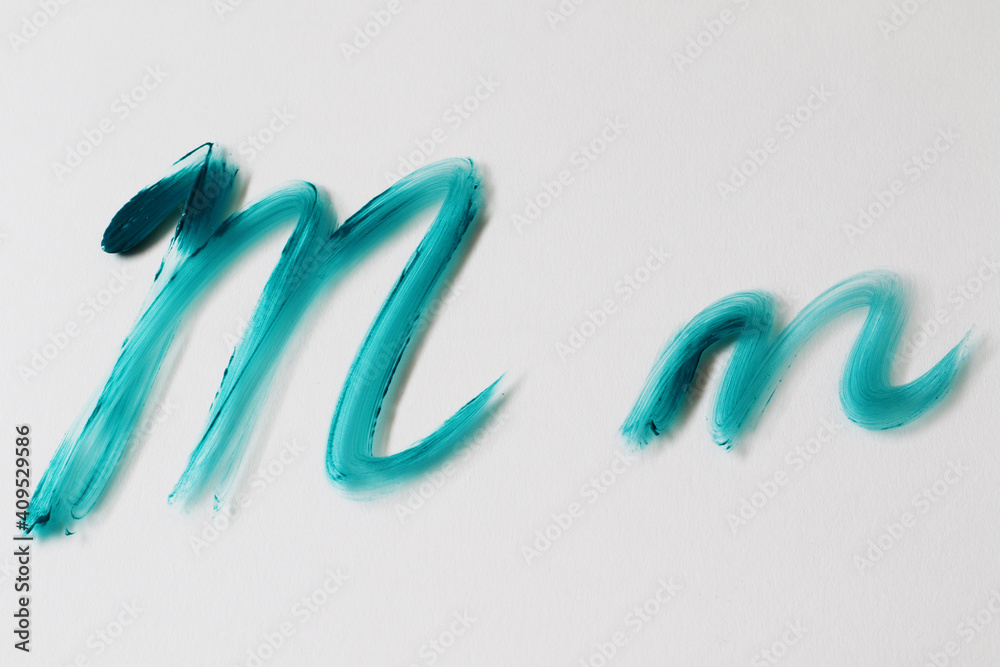 Fototapeta premium brush painted turquoise watercolour letter 