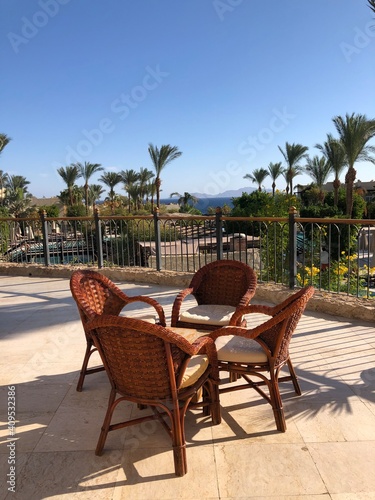 table and chairs on the beach