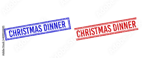 CHRISTMAS DINNER rubber watermarks with distress style. Vectors designed with double lines, in blue and red versions. Caption placed inside double rectangle frame and parallel lines.