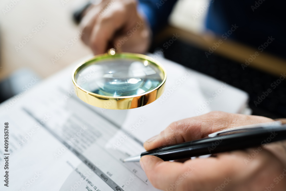 Fraud Detective Using Magnifying Glass