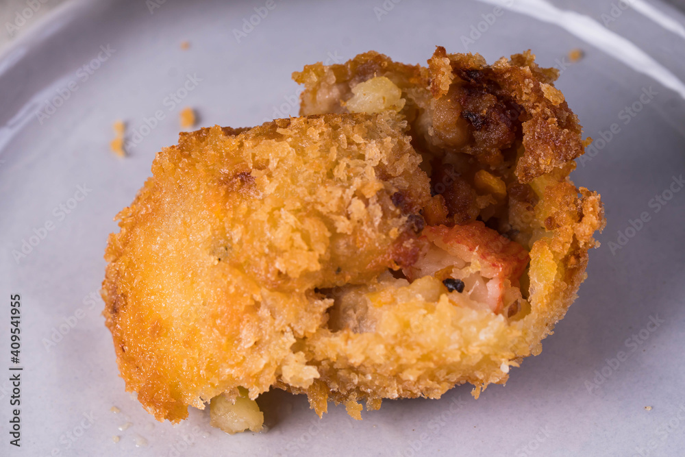 Seafood Korokke or Japanese potato croquettes  are made from mashed potato mixed with ground beef and carrots then deep fried