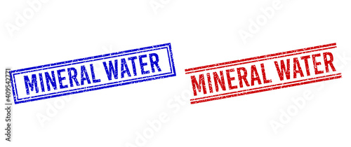 MINERAL WATER rubber watermarks with distress style. Vectors designed with double lines, in blue and red versions. Tag placed inside double rectangle frame and parallel lines.