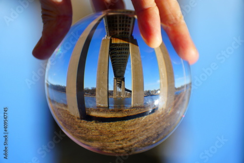 The view of William V Roth Bridge captured through a crystal lens ball near Middletown, Delaware, U.S