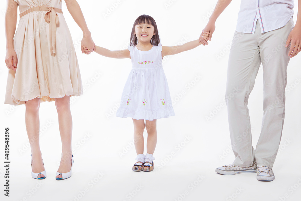 Father,mother and daughter holding hands