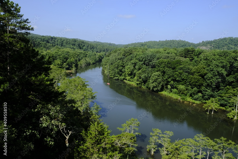 View of the river between the woods in Beavers Bend State Park, Oklahoma