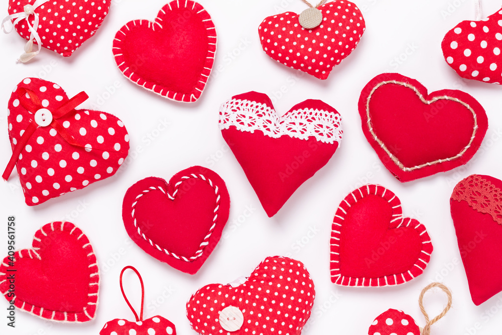 Close-up of red textile hearts on white background. Valentines Day greeting card - Image