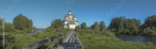 Summer panorama with the ancient cathedral of the Smolensk Icon of the Mother of God. Olonets, Karelia photo