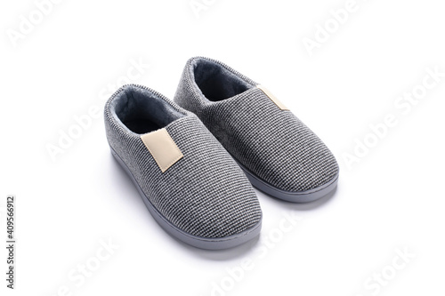 Soft gray shoes to keep you warm on a white background.