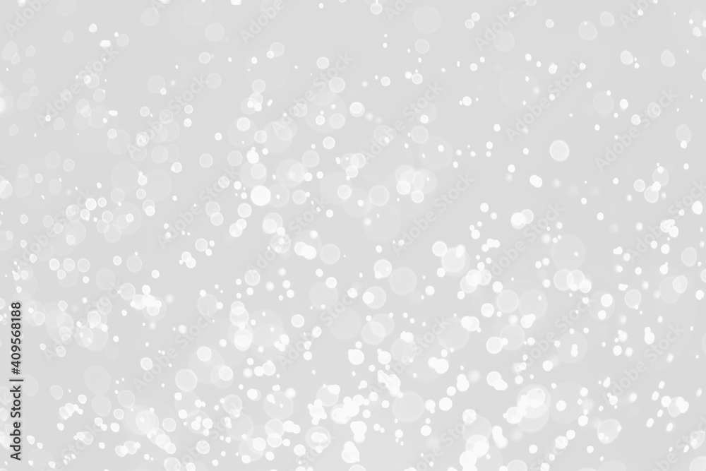 White and silver blur abstract background with bokeh lights