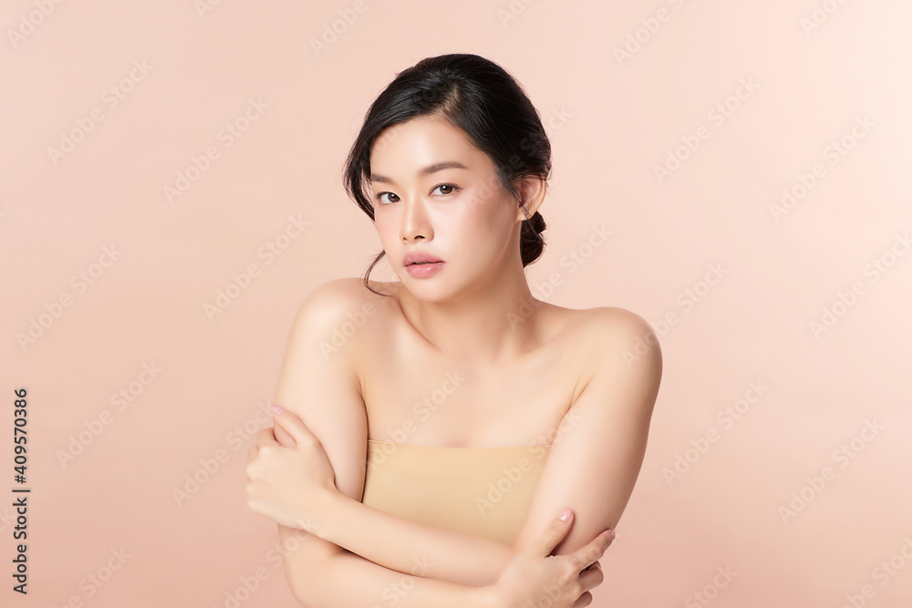 Beautiful young asian woman with clean fresh skin on beige background, Face care, Facial treatment, Cosmetology, beauty and spa, Asian women portrait Beautiful young asian woman with clean fresh skin on beige background, Face care, Facial treatment, Cosmetology, beauty and spa, Asian women portrait