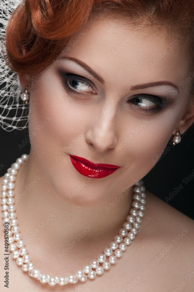 Portrait of gorgeous bright young woman with pearl necklace Portrait of gorgeous bright young woman with pearl necklace